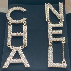 CHANEL Crystal CHA-NEL Logo Earrings